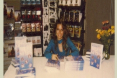 Charlotte Laws signing her first book in her 20s