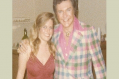 Charlotte Laws and Liberace. She had to crash OUT of his house