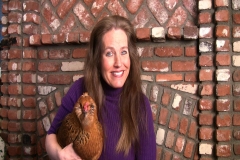 Charlotte Laws and one of her hens